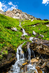 Mountain Creek With Freshwater Waterfall In National Park Hohe Tauern In Tirol In Austria