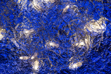 crumpled foil with Christmas lights