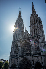Fototapeta premium Sun light diffraction. Scenery street perspective from Oostende, Belgium. Lovely summer day, walking in the city, perfect moment for travel photography