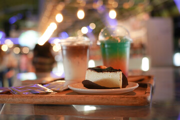 Fruity juice mixing syrup soda and ice in the coffee shop.  