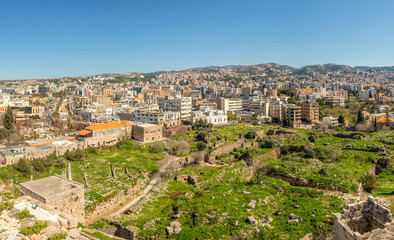 Fototapeta na wymiar Mediterranean city downtown panorama with crusaider castle ruins in the foreground, Jbeil, Biblos, Lebanon