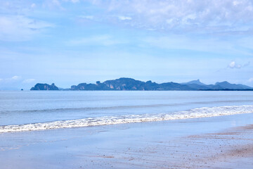 Sea and beach with mountain in tranquil scene