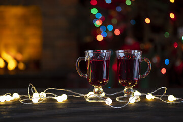 Christmas Eve Party Table. Fireplace and Christmas tree, treats, warmth, cozy family hearth