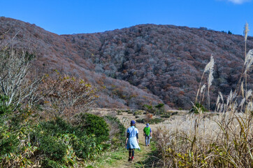 person walking in the mountains