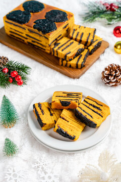 Lapis Legit or Thousand Layers Cake with prunes as topping and filling. 

Spekkoek or lapis legit is popular in Indonesia and is served as a holiday treat, especially for natal, imlek, and lebaran.