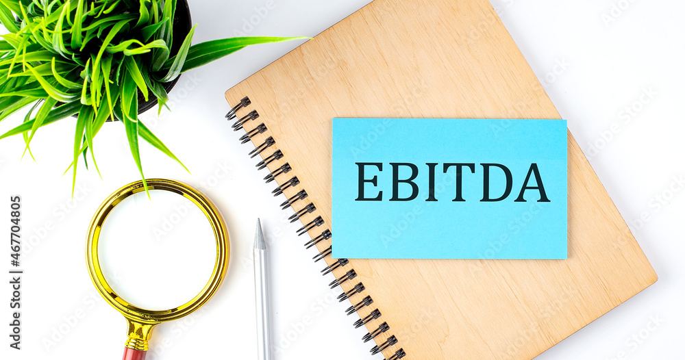 Poster notebook with tools and notes with text on the blue sticker ebida