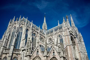 Foto op Aluminium Partial low angle view of the cathedral of Oostende in Belgium © lightcaptured