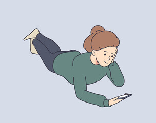 Communication, comfort, smart. Young smiling attractive girl using a smartphone writes or speaks at home after school.