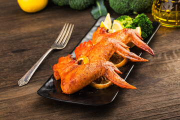 A plate of freshly baked chicken wings