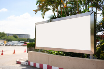 Mockup Large white blank billboard or white promotion poster displayed on the outdoor against. Promotion information for marketing announcements and details.