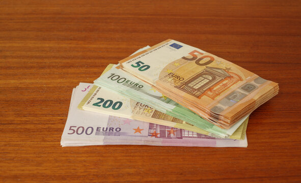 Close up of a stack of different Euro banknotes as a background image for financial topics.