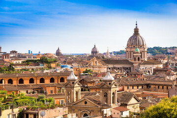Fototapeta na wymiar Rome cityscape with blue sky and clouds, Italy