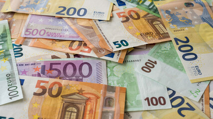 Various Euro banknotes as background image for financial issues.