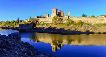 Panoramic view of the Lozoya river next to the castle and the city wall of Buitrago, Madrid.