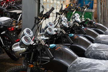 Fototapeta na wymiar a number of new motorcycles in the factory, finished products for sale