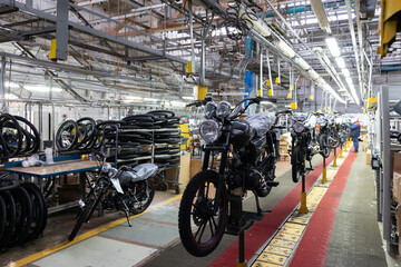 modern motorcycle assembly line of motorcycles and scooters