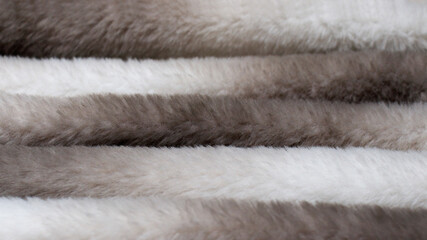 Faux fur texture in the form of waves of gray color. The Concept of Abandoning Natural Fur