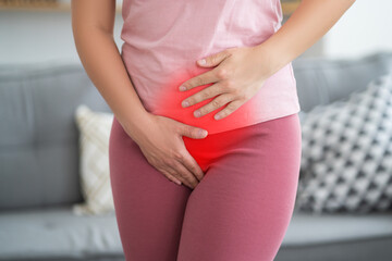 Menstrual pain, woman with stomachache suffering from pms at home, endometriosis, cystitis and...