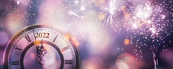 countdown clock 2022 at new years celebration night with firework explosion, abstract party concept...