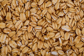 background of ripe oatmeal grains macro photo

