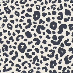 Animal skin seamless repeat pattern. Random placed, vector spot leopard print all over surface print on beige white background.