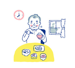 笑顔で朝食を食べるシニア男性