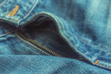zipper on classic denim jeans close up