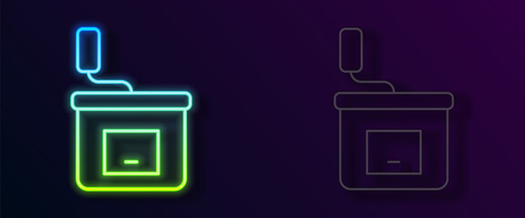 Glowing neon line Manual coffee grinder icon isolated on black background. Vector