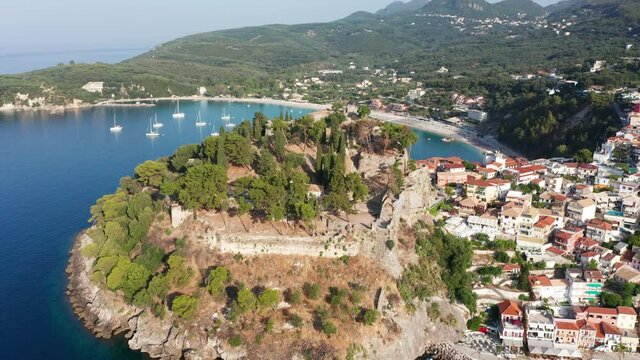 Aerial view of Venetian fort on mountain of Parga and Valtos beach at summer in Greece
