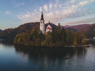 Fototapeta premium Drone views of the Pilgrimage Church of the Assumption of Maria in Bled, Slovenia