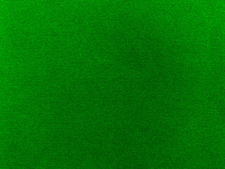 Dark green velvet fabric texture used as background. Empty green fabric background of soft and...