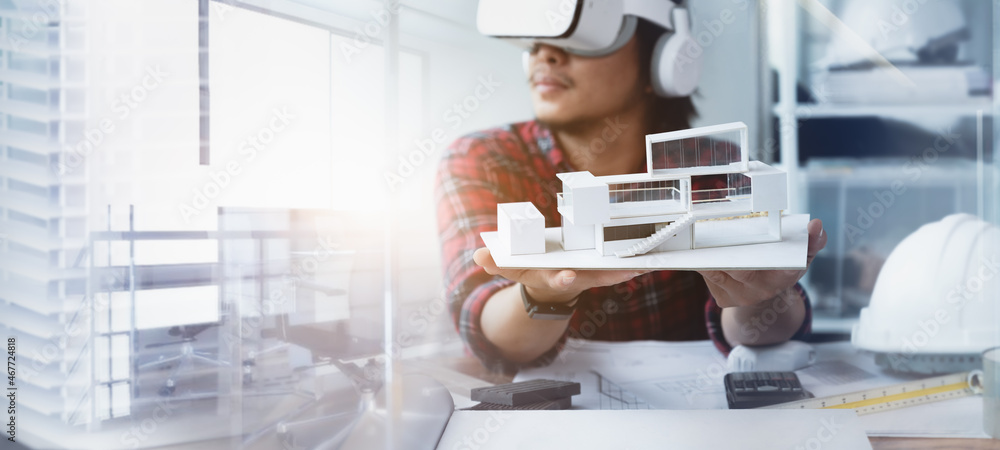 Fototapete engineer or architects wearing virtual reality headsets for work with virtual reality modeling softw
