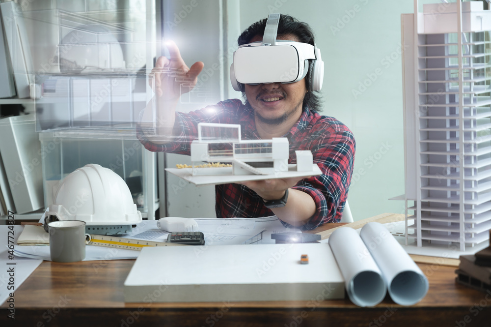 Fototapete engineer or architects wearing virtual reality headsets for work with virtual reality modeling softw