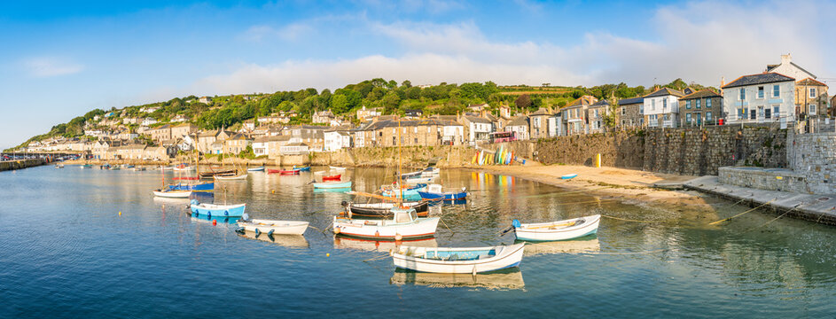 Mousehole harbour village panorama in morning light in Cornwall. United Kingdom