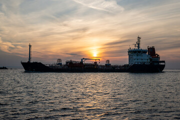Tanker at sunset, ship silhouette
