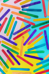 Colorful wooden sticks on color background. colorful ice cream stick , ice cream stick art. Wooden Popsicle Sticks.