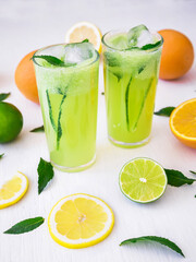 Fresh diet drink with cucumber, lime, lemon and orange