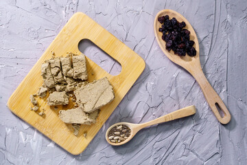 Sunflower halva. Halva pieces grey background. Top view