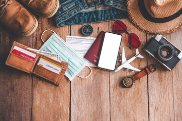 Protecting COVID-19 while Traveling. Travel accessories costumes. Passports, luggage, The cost of...