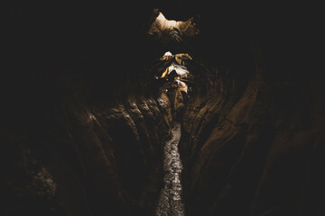 exploring underground caves with stalactite and stalagmite growth