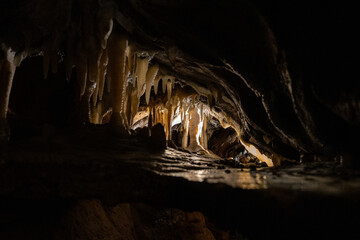 exploring underground caves with stalactite and stalagmite growth