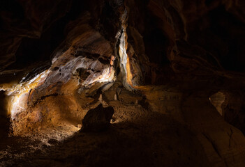 exploring underground caves with stalactite and stalagmite growth