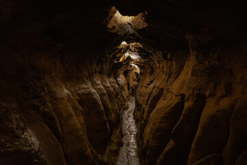 exploring underground caves with stalactite and stalagmite growth