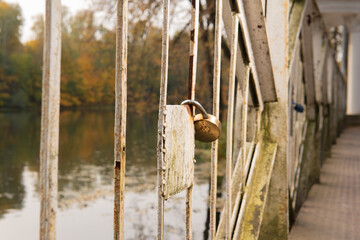 Wedding tradition background bridge travel, fence security happiness hanging white, close. Durable married steel chain