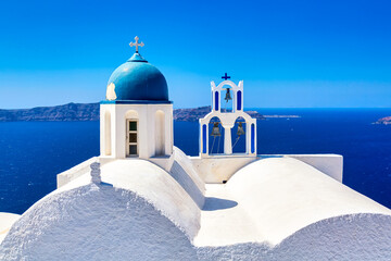 The Chapel of Panagia Theoskepasti with Aegean sea. Skaros rock, Imerovigli, Santorini island,...