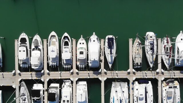 flying over boats at a marina
