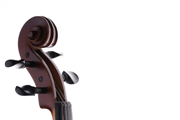 A croll and pegs of a wooden violin or viola on a white background.  No.3 © Janisphoto