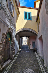 A narrow street in Castel di Sasso, a small village in the mountains of the province of Caserta,...