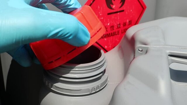 Open the lid of hazardous chemical tanks used in industry and laboratories