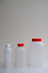 Set of plastic bottles for water analysis. Drinking water analysis. Copy space. Vertical image.